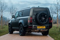 Land Rover Defender 130 V8 review: rear three quarter static, black paint