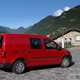 VW Caddy TGI review - rear view, parked by mountain