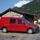 VW Caddy TGI review - side view, parked by mountain