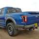 Ford F-150 Raptor review - rear view, parked off road in the UK