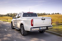 Mercedes X-Class X 350 d V6 pickup review - rear view, white, driving