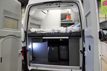 VW Grand California campervan makes UK debut at CCM Show 2019 - rear doors open showing sleeping area and storage