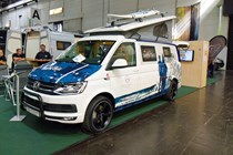 VW Transporter Santa Cruz campervan with surfboard