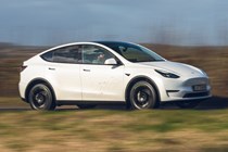 Tesla Model Y profile driving