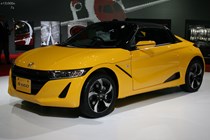 Image of a Honda S660, a compact sports car available for import from Japan to the UK.