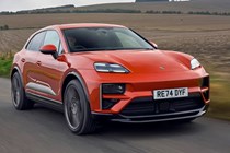 The safest cars on sale: Porsche Macan, front three quarter driving, orange paint