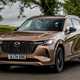 The safest cars on sale: Mazda CX-80, front three quarter driving, bronze paint