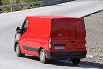 Renault Master, Nissan NV400, Vauxhall Movano 2019 facelift spy shot - rear view, driving round corner, red