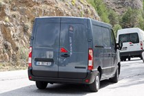 Renault Master, Nissan NV400, Vauxhall Movano 2019 facelift spy shot - rear view, grey, with silver van in background