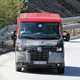 Renault Master, Nissan NV400, Vauxhall Movano 2019 facelift spy shot - dead-on front view, driving down hill