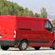 Renault Master, Nissan NV400, Vauxhall Movano 2019 facelift spy shot - rear view, red, driving round corner