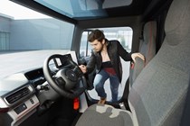 Renault EZ-Flex electric small van concept - cab interior with deliver driver accessing parcel via passenger door