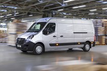 2019 Vauxhall Movano facelift - front view, silver, driving through warehouse