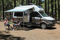 VW Grand California camper review - set up for camping in the woods