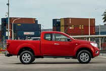 2019 Nissan Navara - King Cab, red, side view showing increased rear suspension height