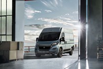 2019 Fiat Ducato MY20 - front view, silver, driving into warehouse