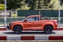 Skoda Mountiaq pickup truck review - side view, driving round karting track