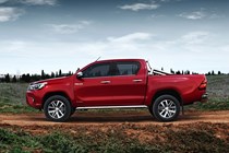 Pickup tax explained - is it the same as vans? Toyota Hilux, side view, red