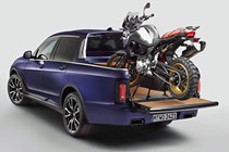 BMW X7 Pick-up - rear three-quarters view with motorcycle in the back