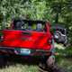 Jeep Gladiator review - rear view, red, driving off-road