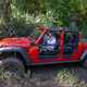 Jeep Gladiator review - red, tube doors, wading through swamp water