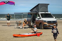 VW California T6.1 campervan - 2019, 2020, front view, on beach, with family