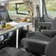 Ford Transit Custom Nugget campervan - dining area showing swivelling front seats