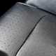 Closeup of a leather car seat base