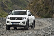 Nissan Navara Off-Roader AT32 2020 - driving on gravel off-road, white