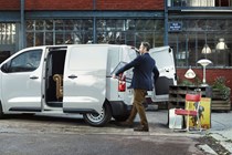Citroen e-Dispatch electric van - rear view, white, electric doors being opened hands-free by foot, 2020