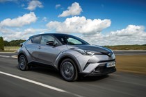 Best used SUVs for less than £15,000: Toyota C-HR front three quarter driving, silver paint