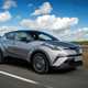 Best used SUVs for less than £15,000: Toyota C-HR front three quarter driving, silver paint