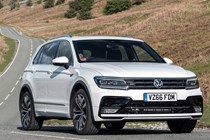 Best used family 4x4s: Volkswagen Tiguan, front three quarter driving, white paint, British B-road
