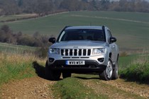 Best used family 4x4s: Jeep Compass, front three quarter static, silver paint, off-road