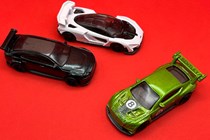 Die cast cars on a red background