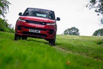 How to drive off-road: Range Rover Sport, driving on grass, low angle, red paint