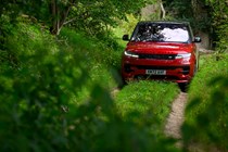 How to drive off-road: Range Rover Sport, driving on grass ruts, low angle, red paint