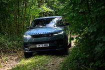 How to drive off-road: Range Rover Sport, driving through a wood, low angle, blue paint