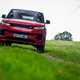 How to drive off-road: Range Rover Sport, driving on grass, low angle, red paint