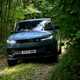 How to drive off-road: Range Rover Sport, driving through a wood, low angle, blue paint