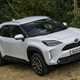 Toyota Yaris Cross: front three quarter off-road static, white paint