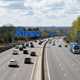 A motorway with cars travelling on it