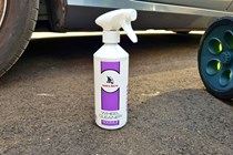 Nielsen Wheel Cleaner next to car