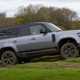 Land Rover Defender 130 grey side off-road - Best SUVs for towing