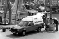VW Caddy 1 - being loaded with fish, black and white
