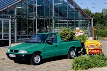 VW Caddy 2 - pickup, green, being loaded
