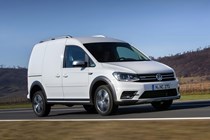 VW Caddy 4 - Alltrack, white, front view, driving
