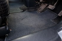 Car mats in a car footwell
