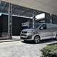 Peugeot e-Expert electric van - silver, front view, charging on driveway, 2020