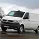 Volkswagen ABT eTransporter electric van - front view, driving, white, snow, 2020